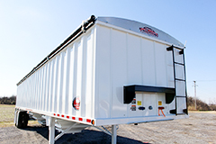 back view of a grain trailer parked on a lot