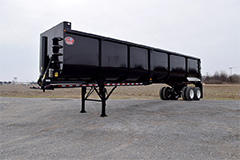 Back and side view of a Clement ScrapStar scrap trailer parked in a lot